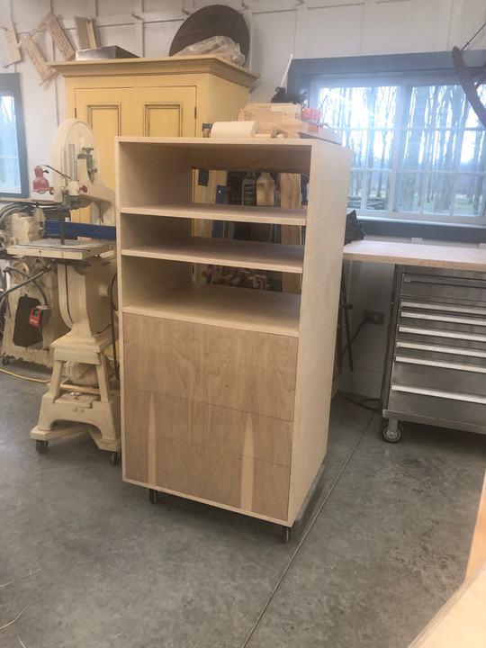 Modern birch cabinet with open shelves above drawers